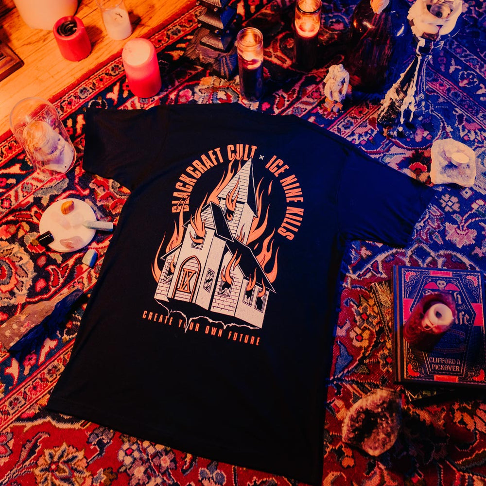 A classic black cotton tee shirt with custom orange and white artwork on the front and back. A limited edition collaboration from Blackcraft and Ice Nine Kills.