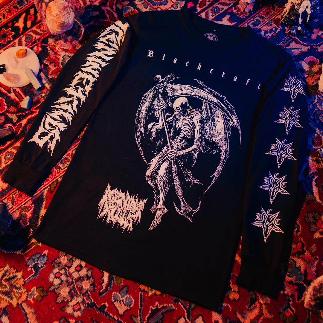 A classic black long sleeve tee shirt with custom white artwork and logos across the front and along the sleeves. A limited edition collaboration from Blackcraft and Ice Nine Kills.