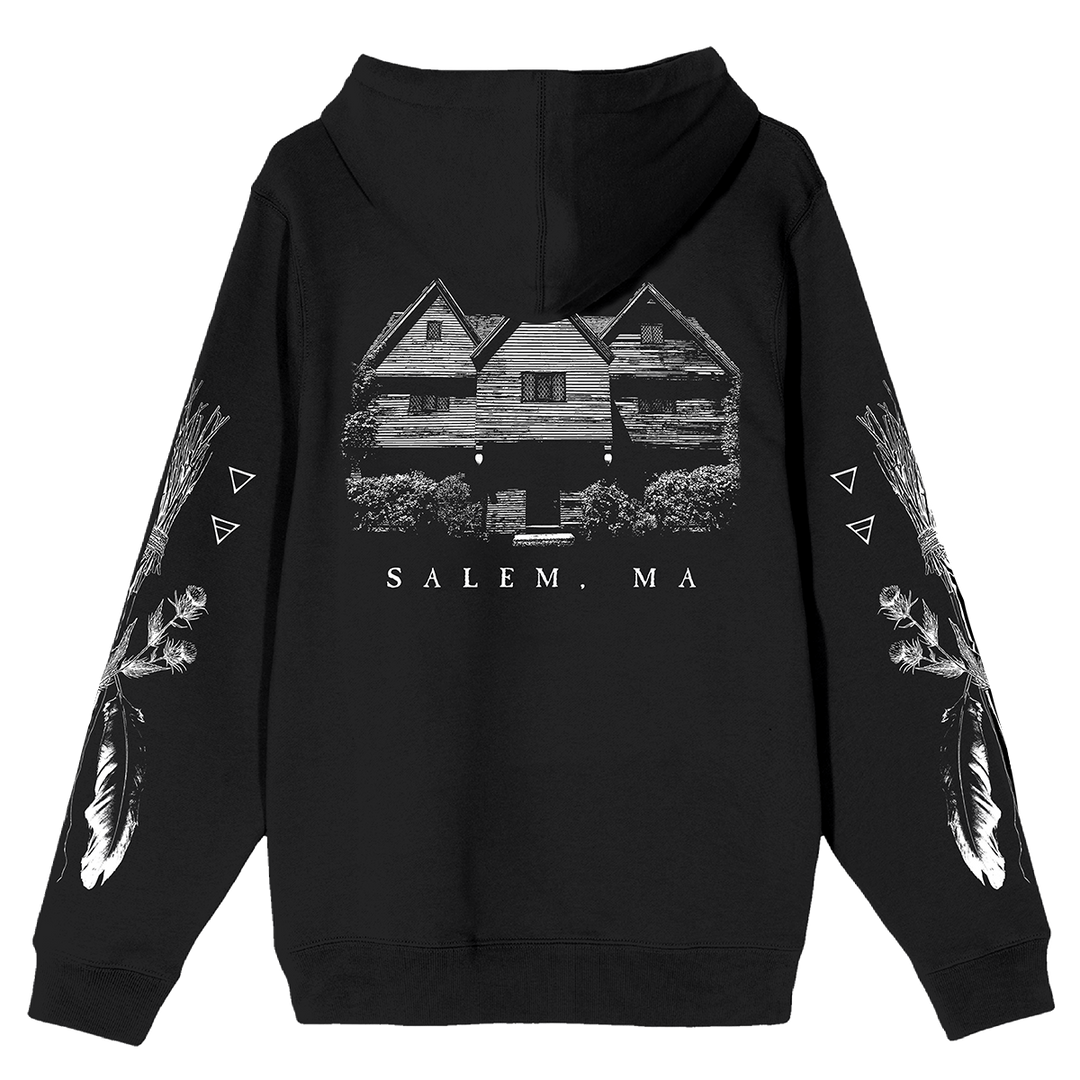 A classic black zip up hoodie with Salem Massachusetts artwork along the front, back, and along the sleeves. 