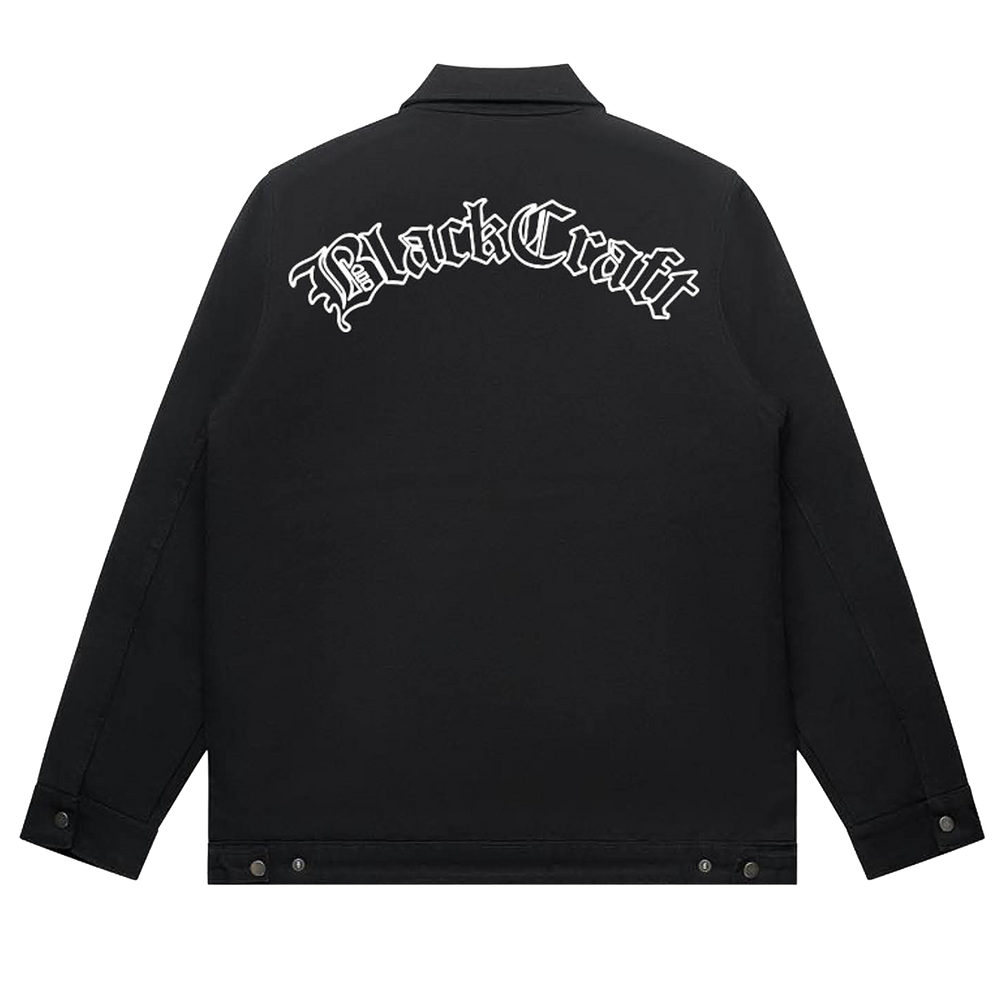 A classic black cotton drill jacket with custom Blackcraft artwork along the back, the collar, and the front. 