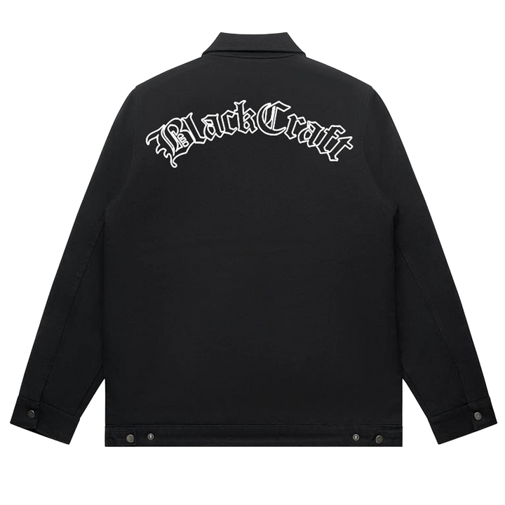 A classic black cotton drill jacket with custom Blackcraft artwork along the back, the collar, and the front. 