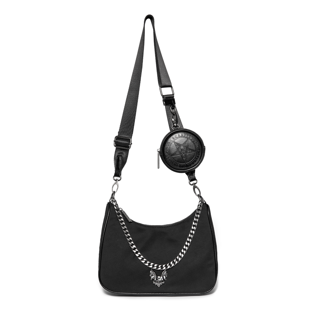 Black nylon crossbody bag with chain top handle and removable coin purse attachment.