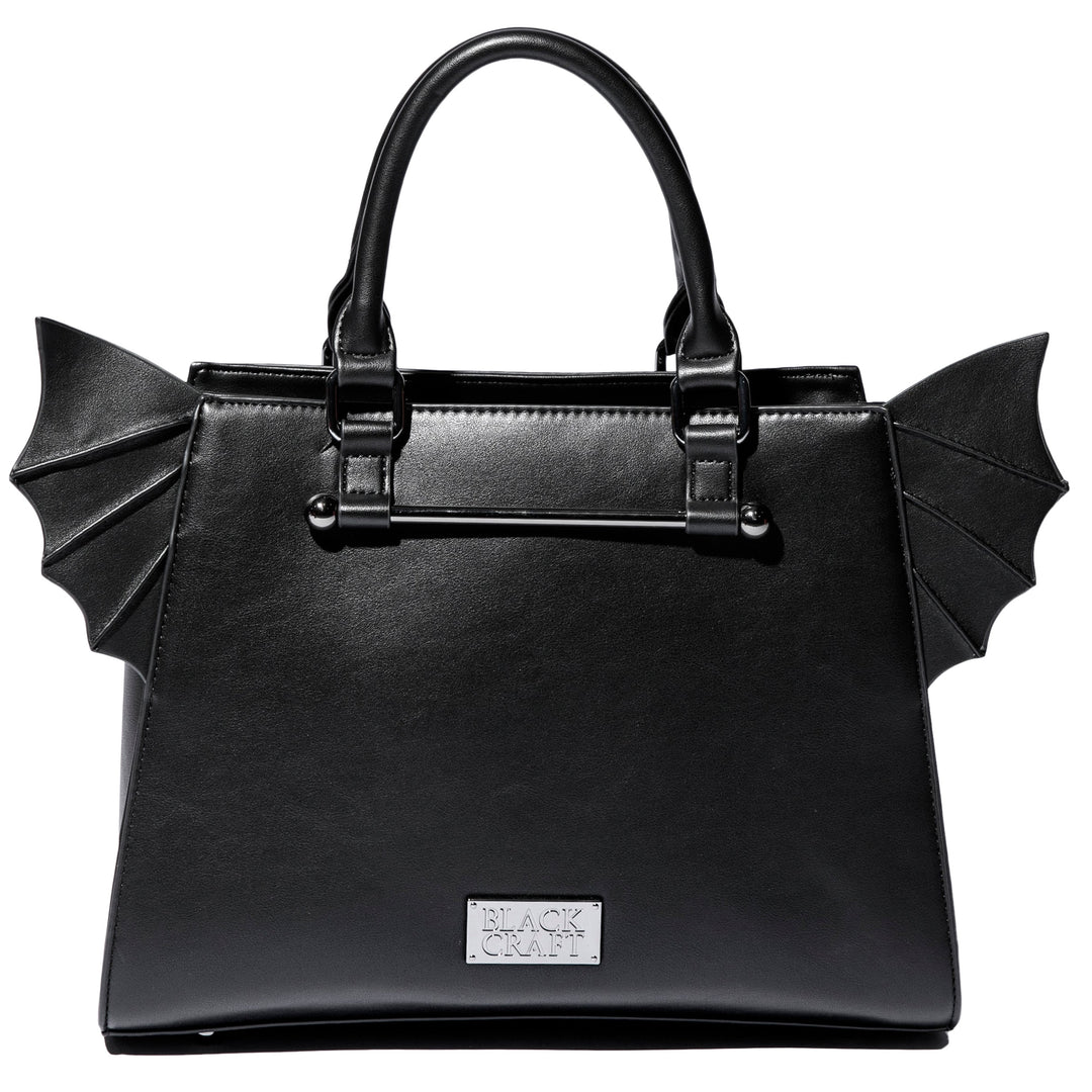 Black faux leather bat wing satchel. 