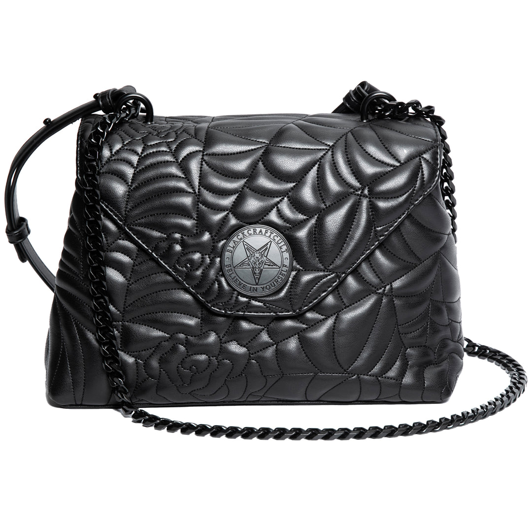 Black spider web inspired shoulder bag with adjustable strap. 