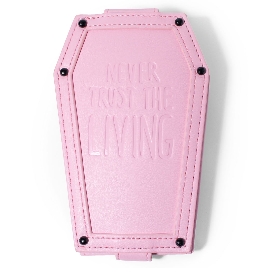 Pink faux leather cardholder in coffin shape.