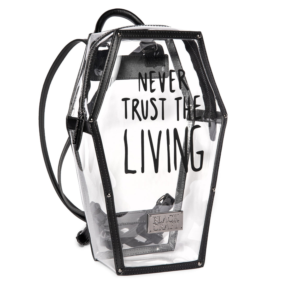 Clear PVC coffin shaped backpack with Never Trust the Living print on front. 