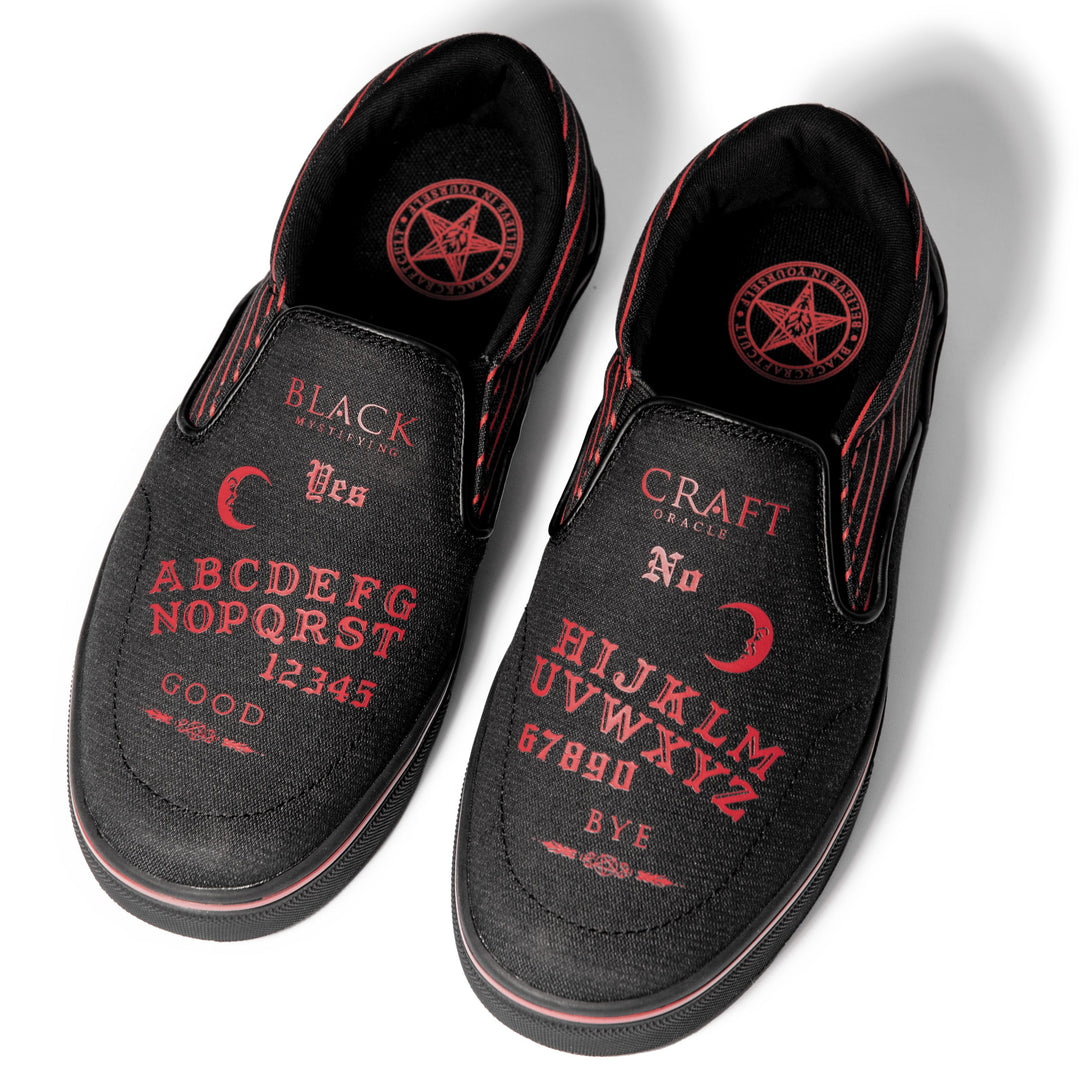 A slip on sneaker featuring our signature Ouija artwork on black canvas fabric upper and custom Blackcraft logo rubber sole.