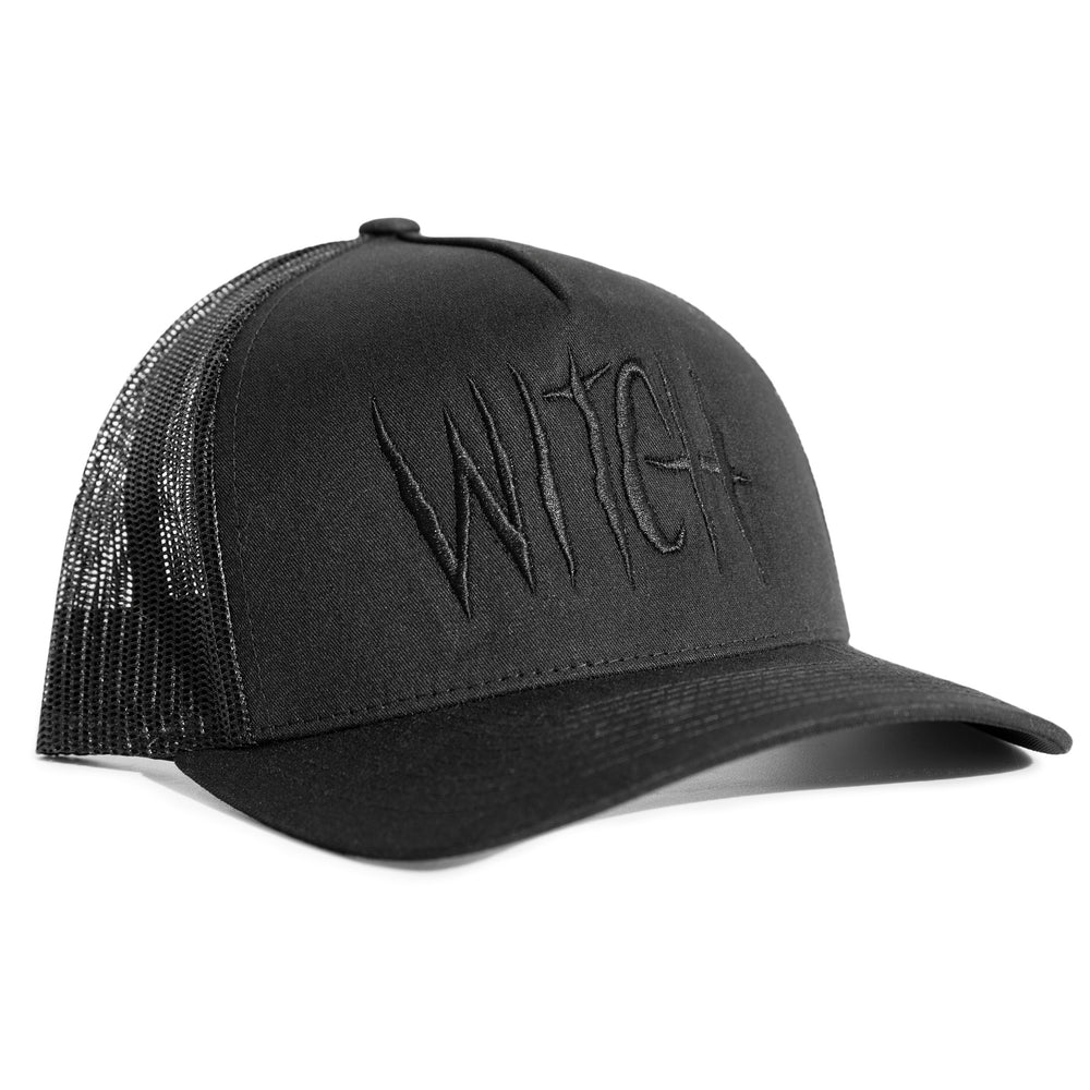 A classic black trucker hat with embroidered metal witch on the front.