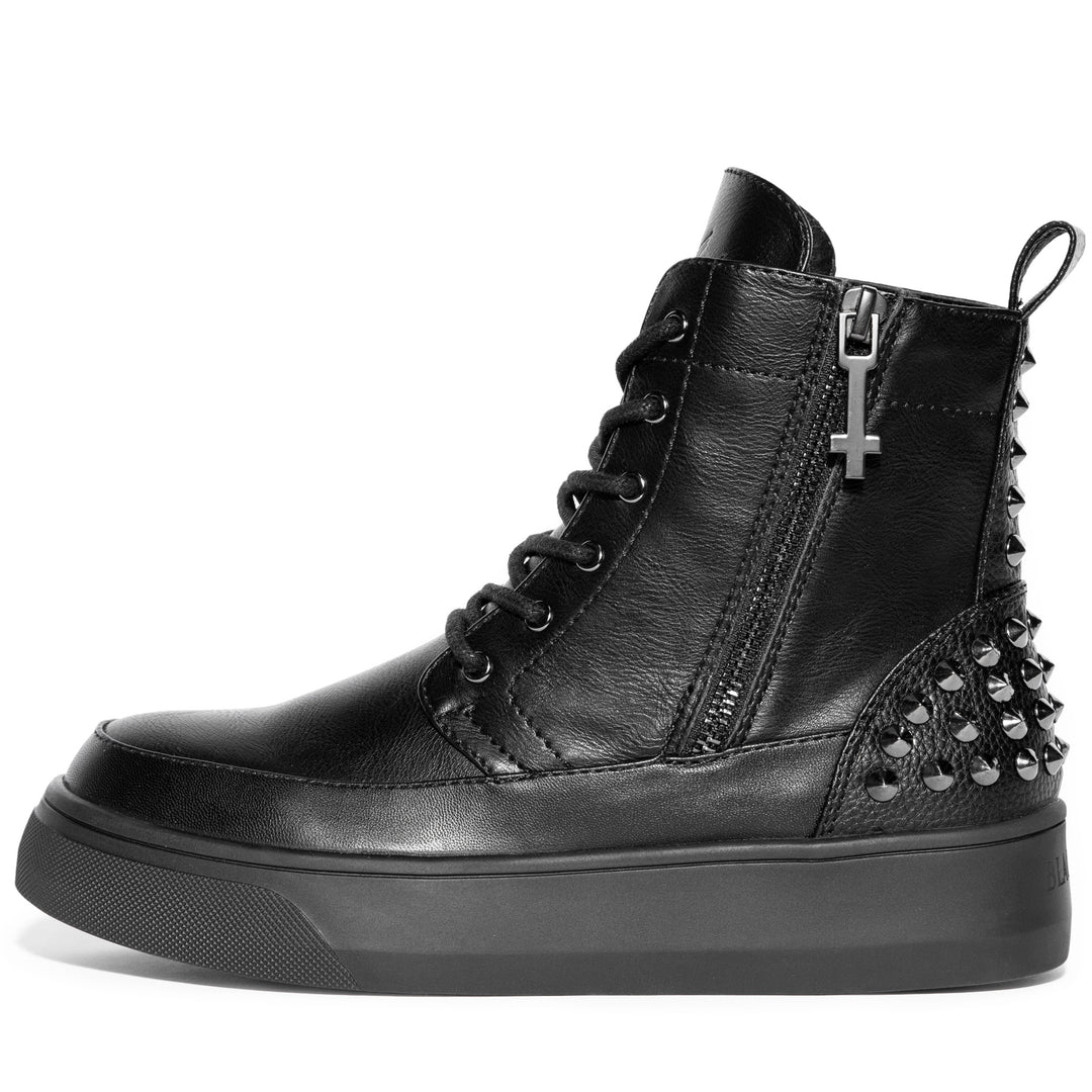 An all black sneaker boot with studded accents.