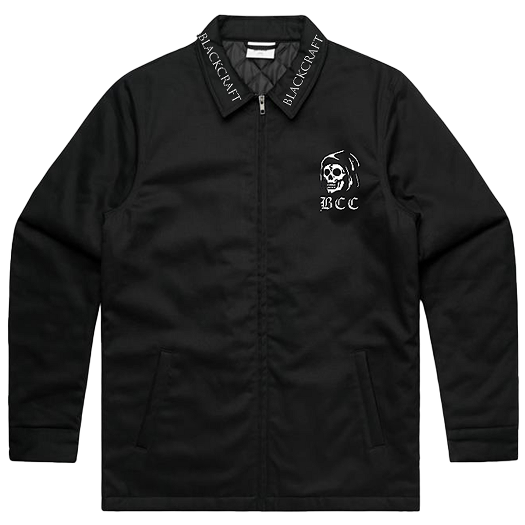 A classic black cotton drill jacket with custom embroidered Blackcraft artwork along the back, the collar, and the front. 