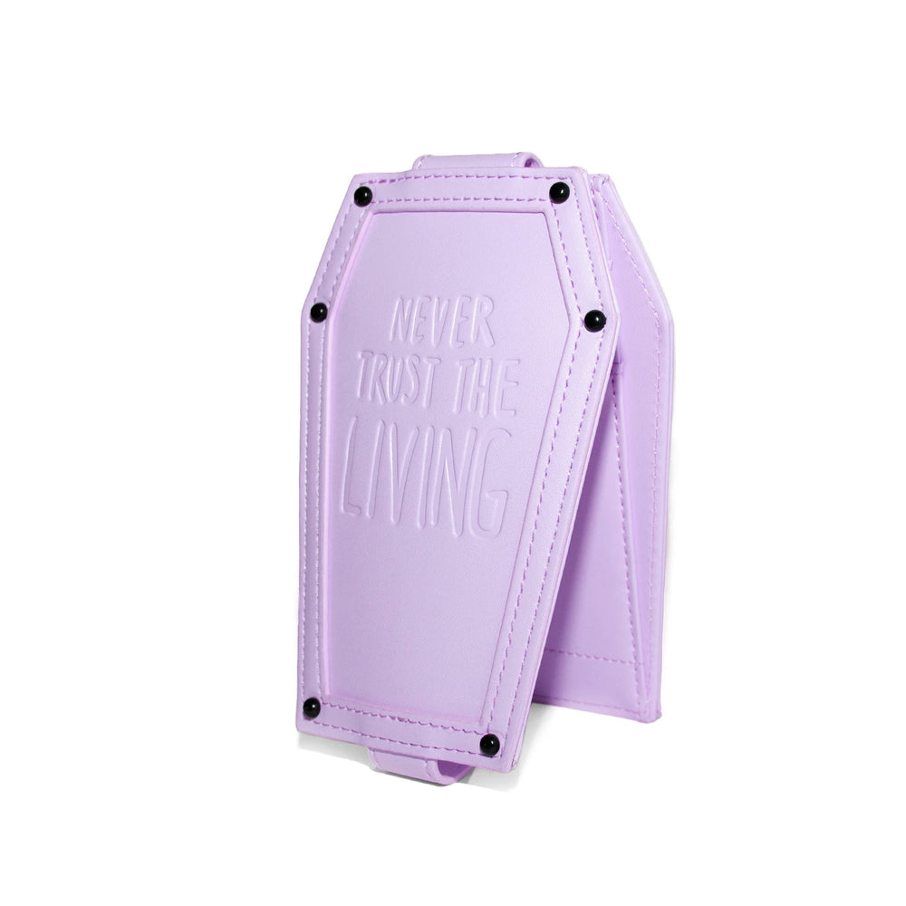 Purple faux leather cardholder in coffin shape.