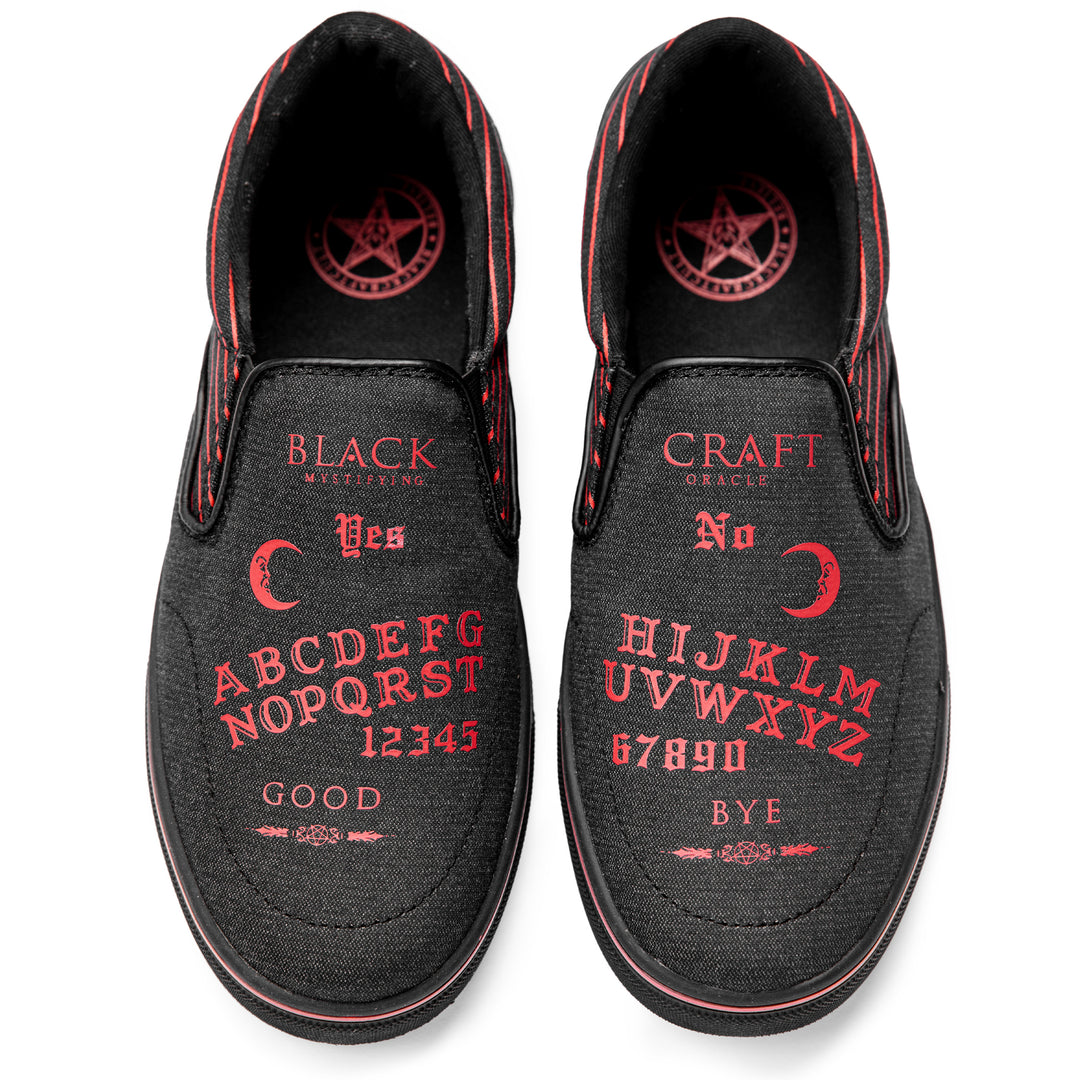 A slip on sneaker featuring our signature Ouija artwork on black canvas fabric upper and custom Blackcraft logo rubber sole.