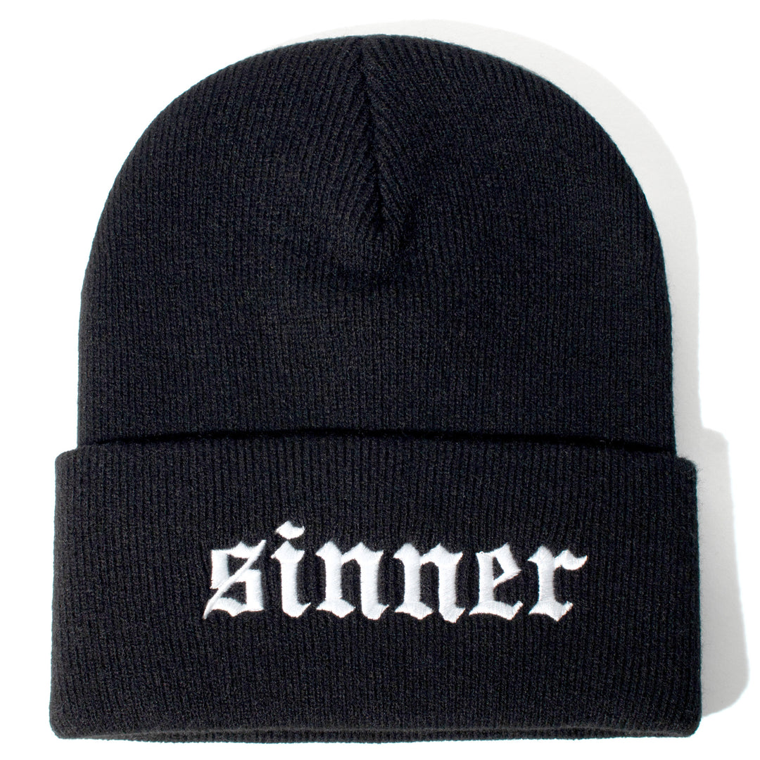 Black beanie with sinner embroidery on front flap.