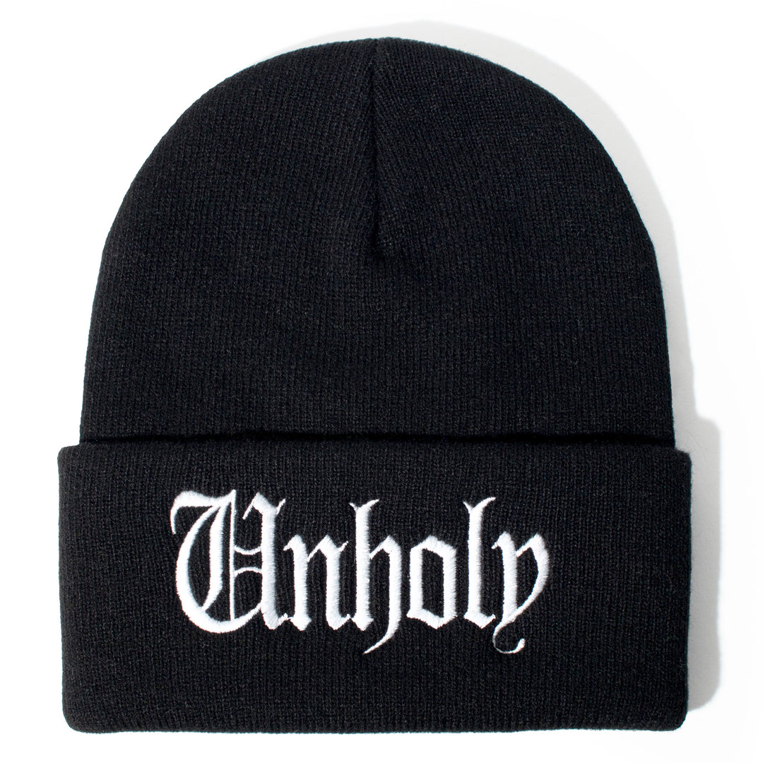 Black beanie with unholy embroidery on front flap.