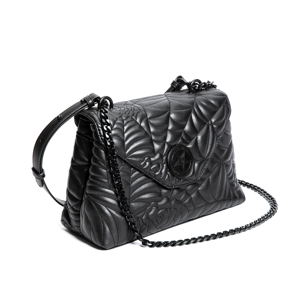 Black spider web inspired shoulder bag with adjustable strap. 