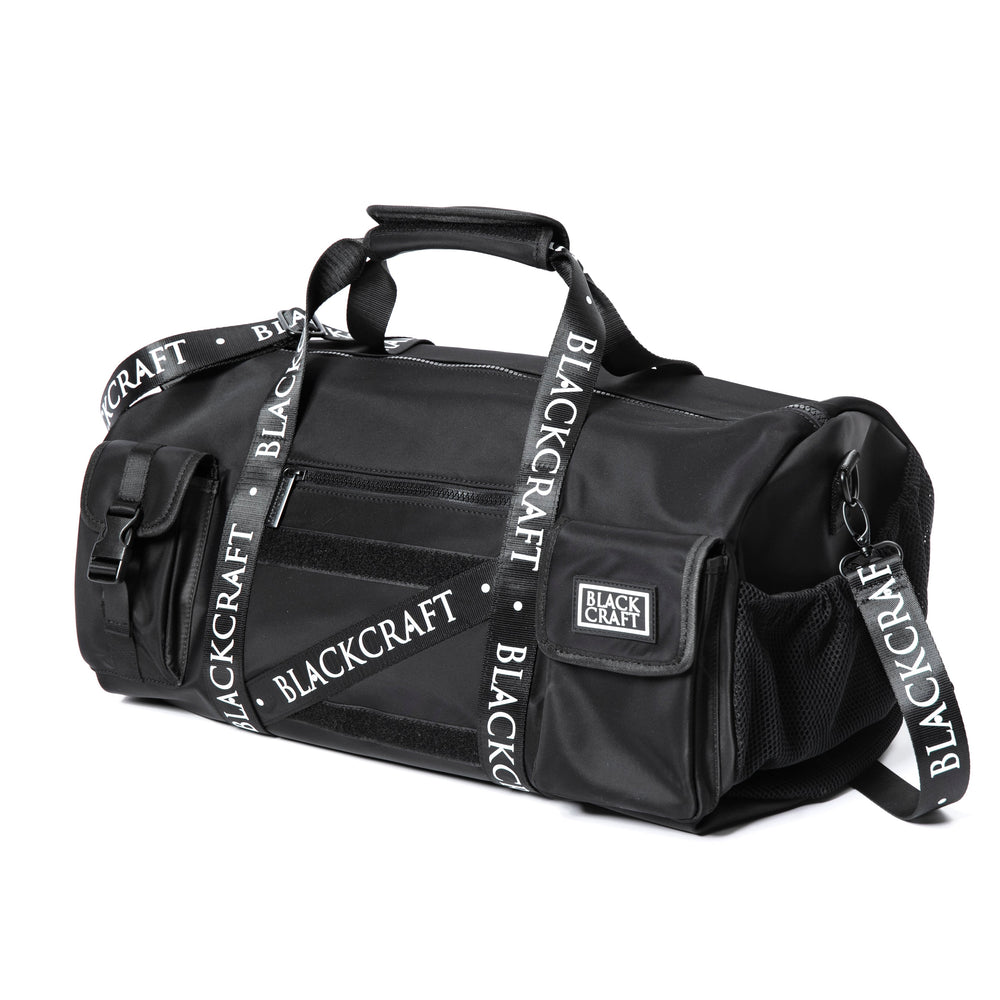 Black nylon duffel bag with Blackcraft rubber logo. 