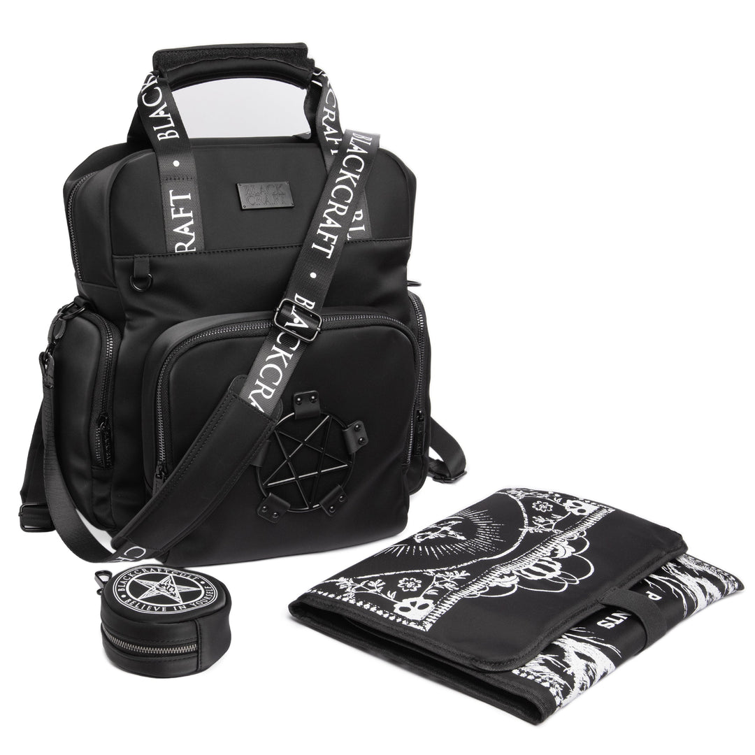 Black nylon diaper bag with top handle, removable and adjustable strap, and backpack straps for multiple options for wear.