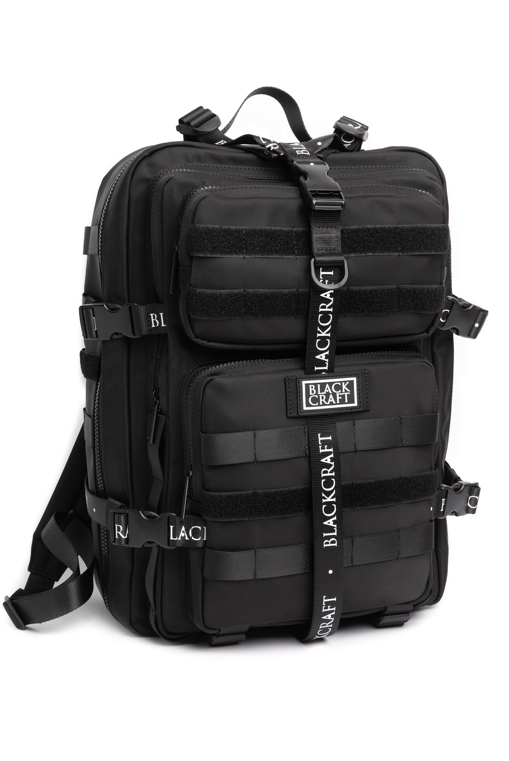 Large black nylon backpack with Blackcraft rubber logo, functional buckles, and logo strap details. 